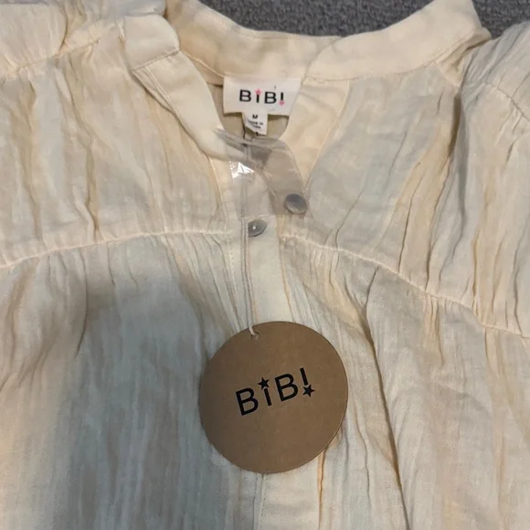 BiBi Light Cream Ruffle Top - Picture 2 of 3